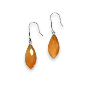 One pair of Carnelian Petal Drop Earrings - flat faceted orange petal stones with sterling silver hooks - on a white background
