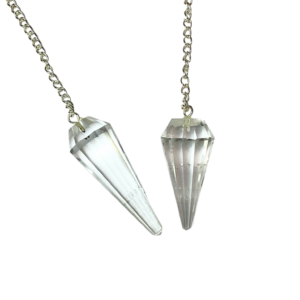 Example of two Quartz Pendulums - transparent stone - on a silver chain, on a white background
