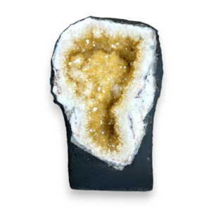 Citrine Cave (7) - half of a giant geode with orange points - on a white background