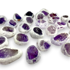 Group of Dragon Egg - Amethyst - purple partially tumbled stones, with a white, rough texture, and one polished face revealing the colour of the stone inside - on a white background