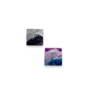 Two Fluorite Square Side-Drilled side by side - square stones with blue, purple, clear and green banding - on a white background