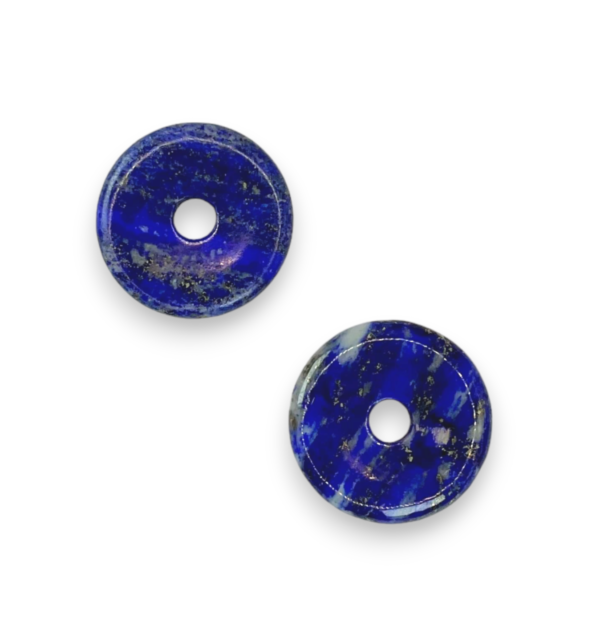 Two Lapis Donut pendants - blue stone with white marbling and gold banding - on a white background