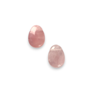 Two Rose Quartz Drop Side-Drilled side by side - pale pink oval stone - on a white background