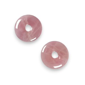 Two Rose Quartz Donut pendants - pale pink stone - on a white background