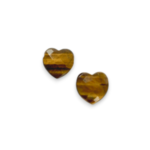 Two Tiger Eye Heart Side-Drilled side by side - faceted hearts containing bands of gold, brown, black - on a white background