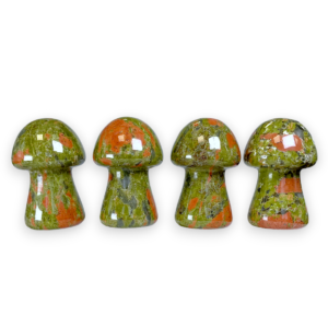 Four Unakite Mushrooms in a row - green with patches of terracotta - on a white background