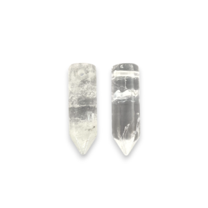 Two Crystal Point Side-Drilled side by side - translucent stone with some inclusions - on a white background