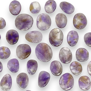 Group of Ametrine Pocket Stones - translucent purple and orange stones - on a white background