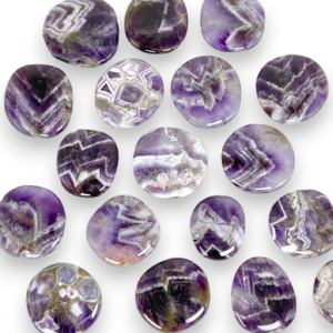Group of Amethyst Dogtooth Pocket Stones - purple and white chevron stones - on a white background