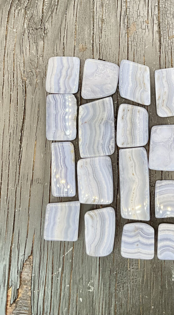 Example of Blue Lace B Slices Grade tumble stone - Beautiful shades of ocean blue with amazing striations