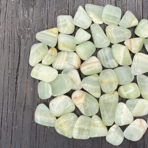 Example of Calcite green Grade tumble stone - Beautiful shade of light seaweed green