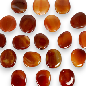 Group of Carnelian Pocket Stones - flat red and orange stones - on a white background