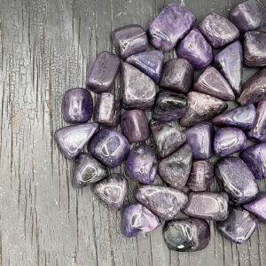 Example of Charoite Dark Grade tumble stone - Classic amethyst purple with darker shades, notes & tones.