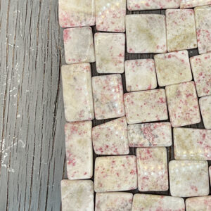Example of Cinnabrite Slice tumble stone - Beautiful shade of off white mixed with pink dots