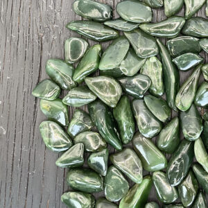 Example of Triplite Wagnerite In Pyrite A Grade tumble stone - Beautiful shade of seaweed green