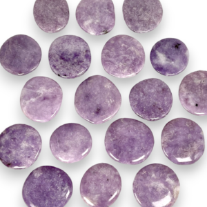 Group of Lepidolite Pocket Stones - pale purple stones - on a white background