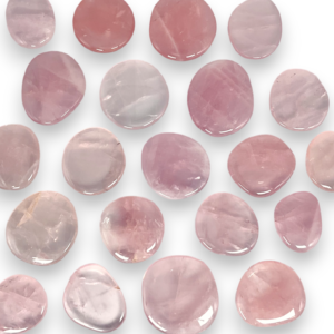 Group of Rose Quartz (Madagascar) Pocket Stones - translucent pale pink stones - on a white background
