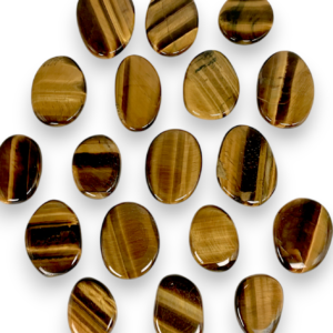 Group of Tiger Eye Pocket Stones - gold, brown and black banded circular stones - on a white background